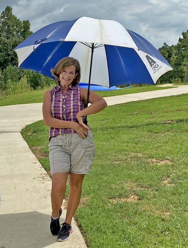 An umbrella is a super fashion accessory.  Strike a pose and look awesome.